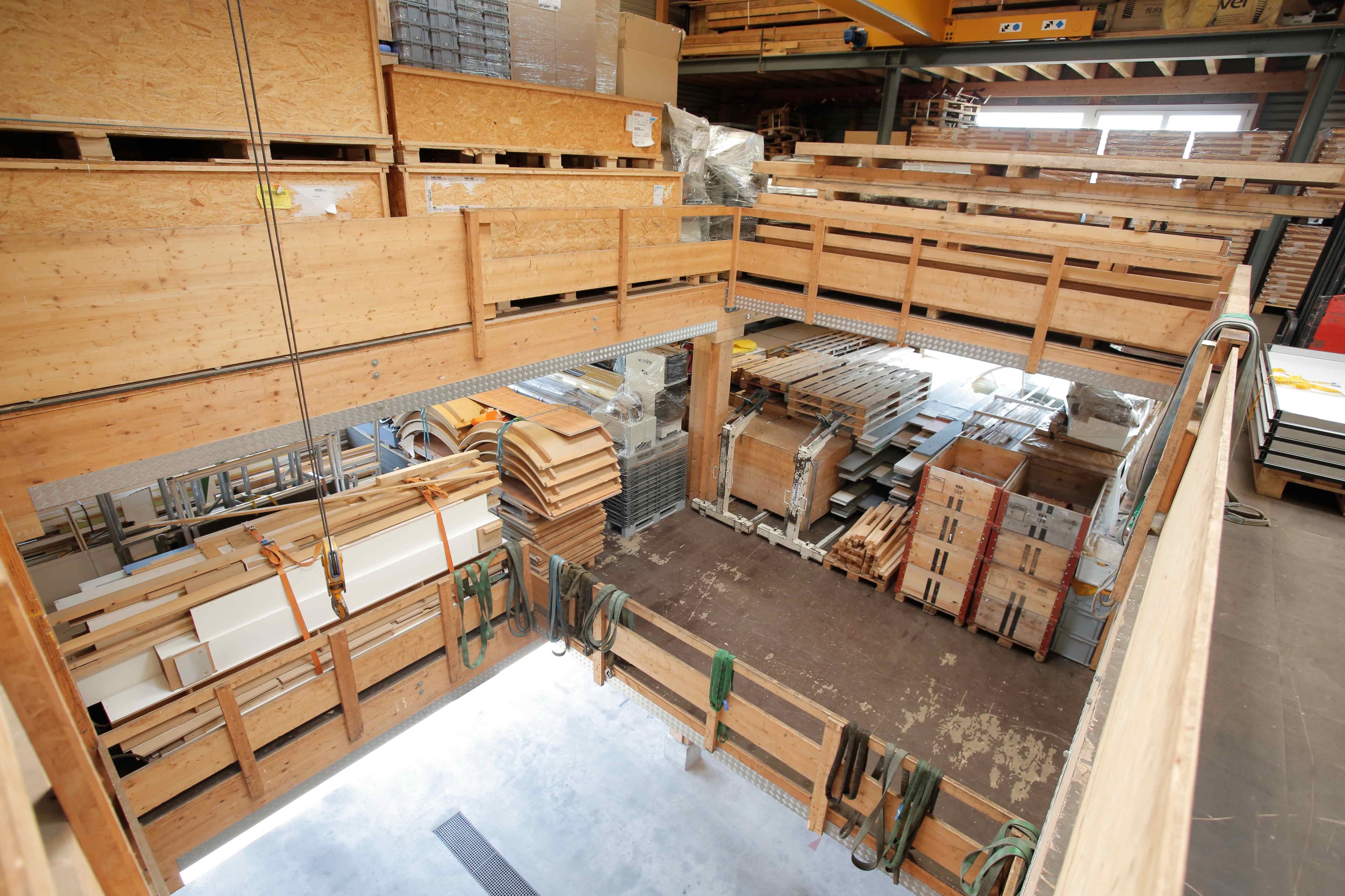 Interior view of Walker's Team AG warehouse facility with multi-level storage systems